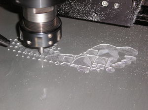 One of our engraving machines at work engraving anodised aluminium